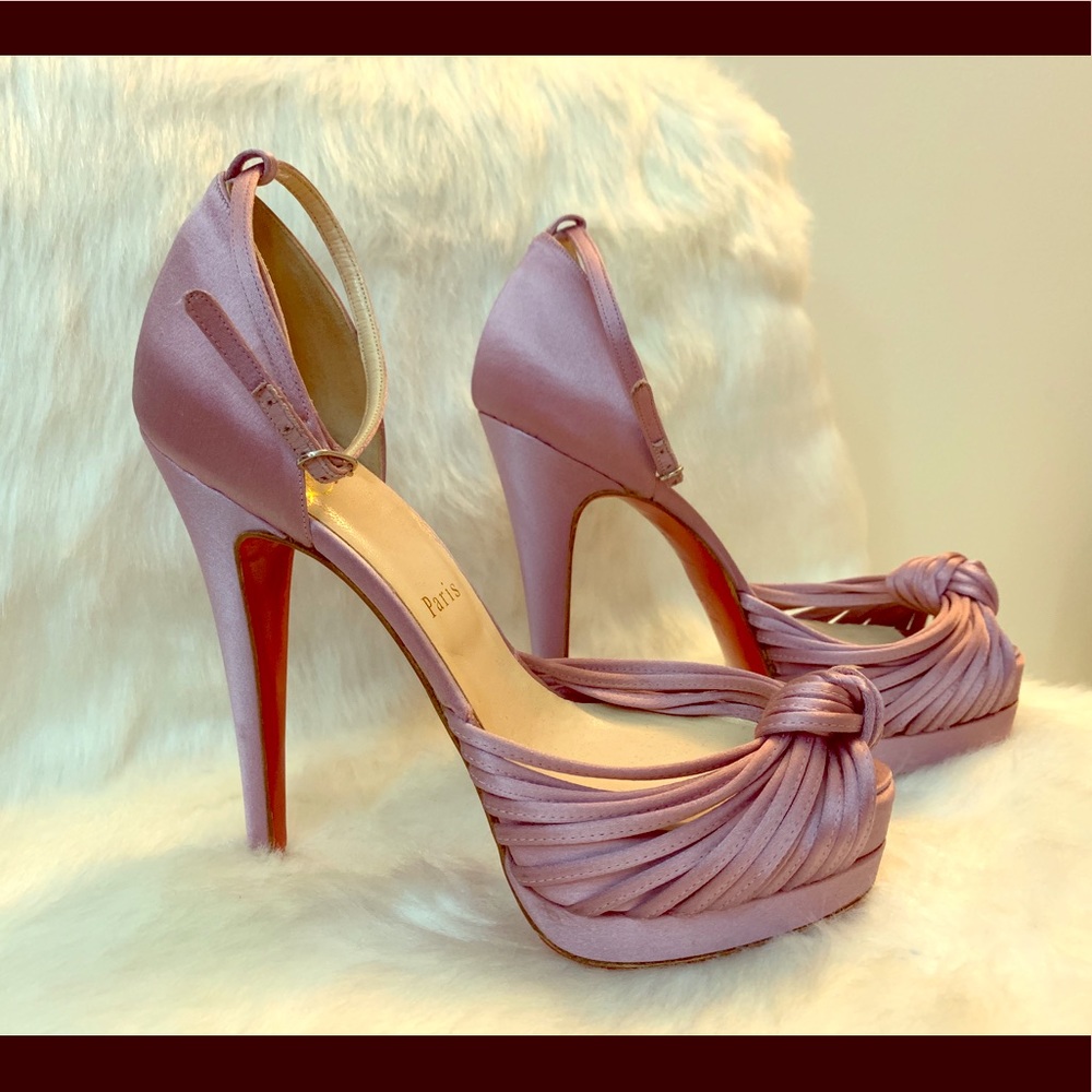 Christian Louboutin satin knot pumps.